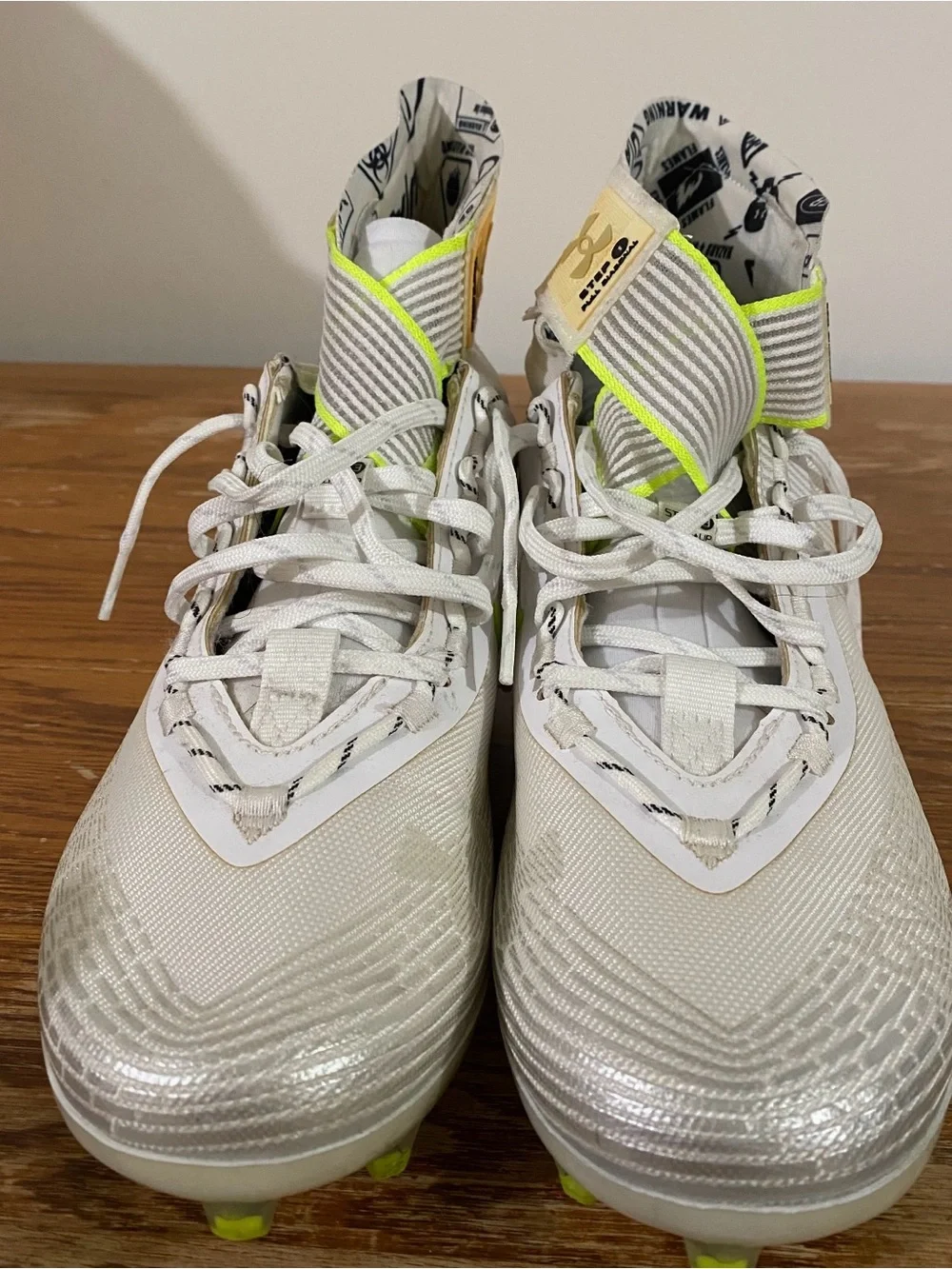 Under Armour men's White Cleats with Neon Yellow Highlights